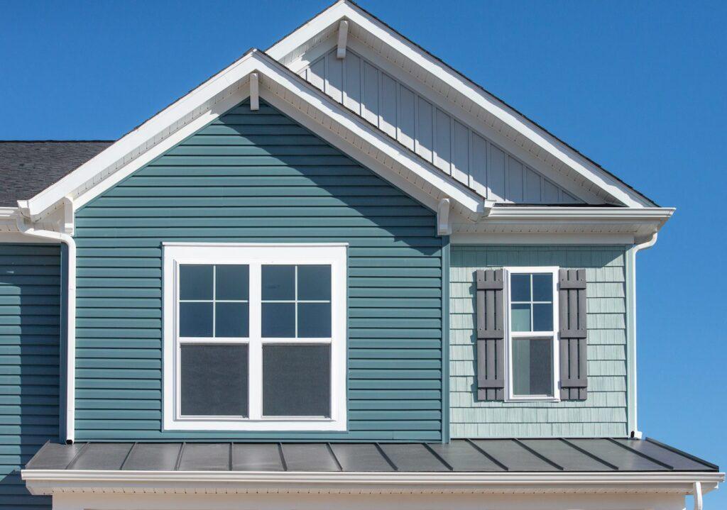 types of siding view of mixed siding materials on home